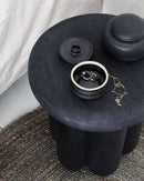 A top view close up shot of the Phant Side Table by the bed side.